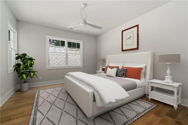 bedroom featuring hardwood / wood-style flooring and ceiling fan