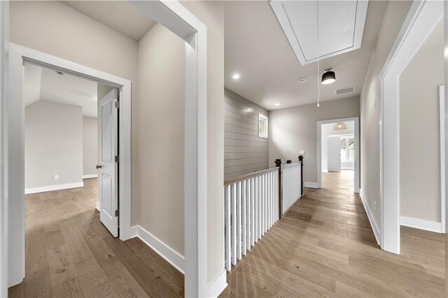 corridor featuring light hardwood / wood-style flooring