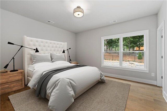 bedroom featuring light hardwood / wood-style floors