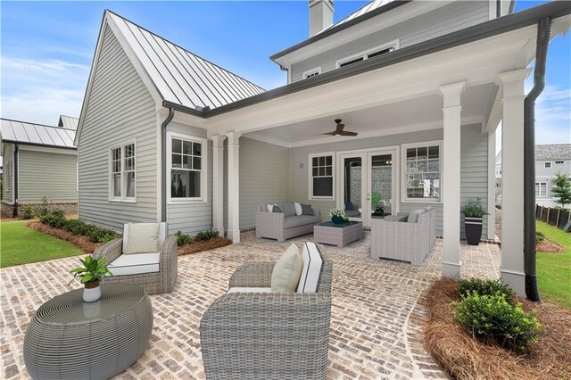 view of patio with ceiling fan and an outdoor hangout area