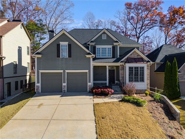 craftsman inspired home with a garage