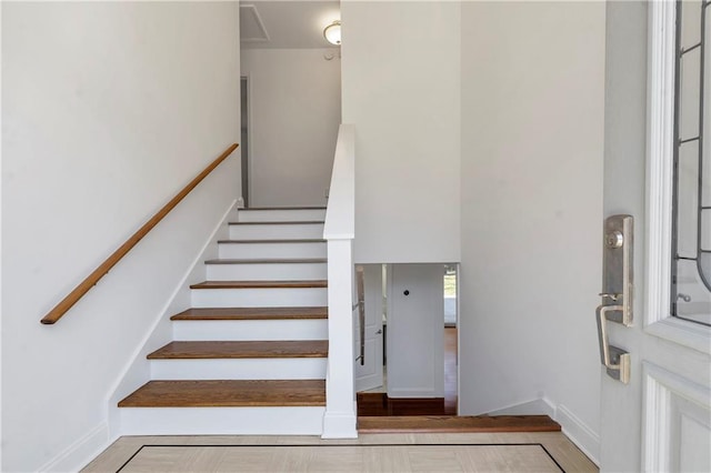 staircase with baseboards