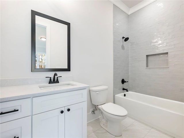 full bathroom featuring vanity, tiled shower / bath combo, and toilet