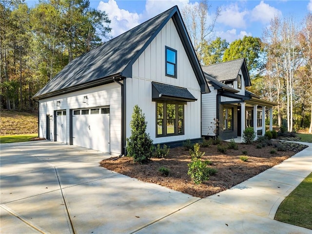 view of side of property with a garage