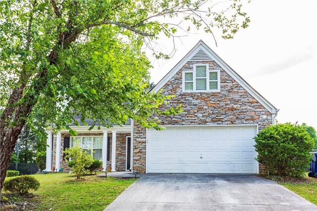 2545 Lake Royale Dr, Riverdale, GA 30296 - view of front of home with a garage