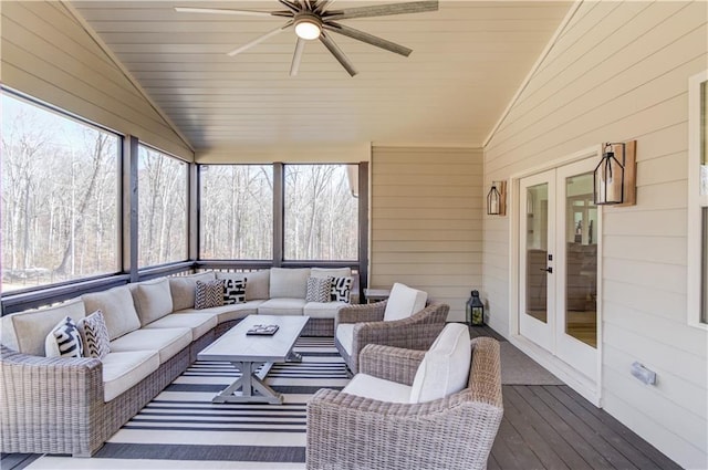 sunroom with wooden ceiling, vaulted ceiling, and french doors