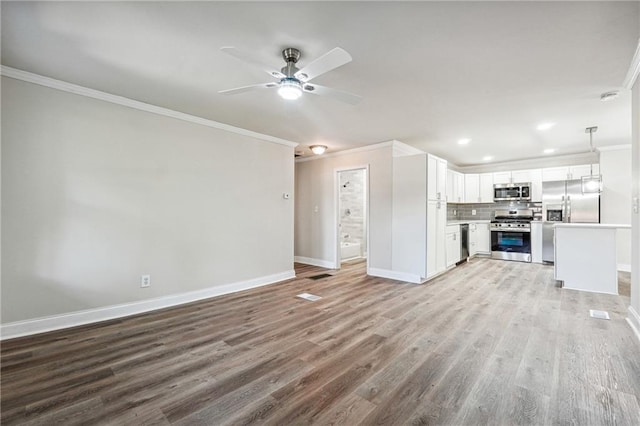 unfurnished living room with ornamental molding, ceiling fan, and light hardwood / wood-style flooring