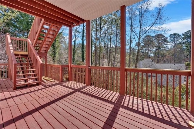 wooden terrace featuring stairway