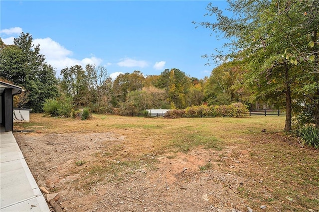 view of yard featuring fence