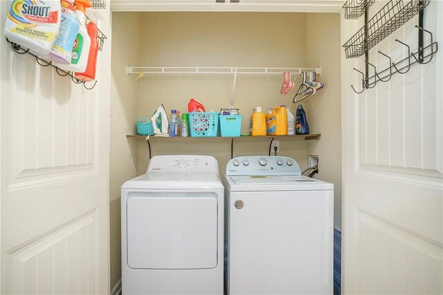 laundry room with washing machine and dryer