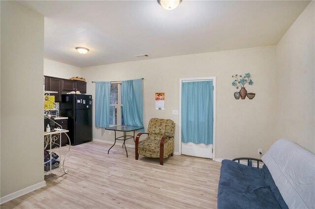 living area with light wood-type flooring