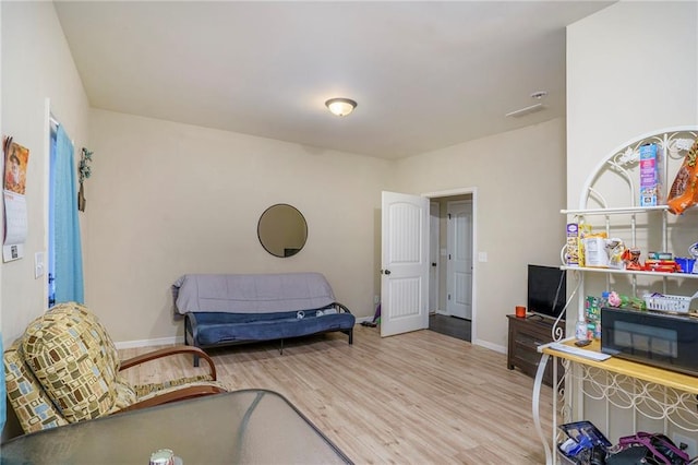 living area with light wood-type flooring