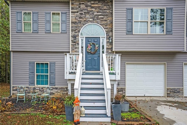 property entrance featuring a garage