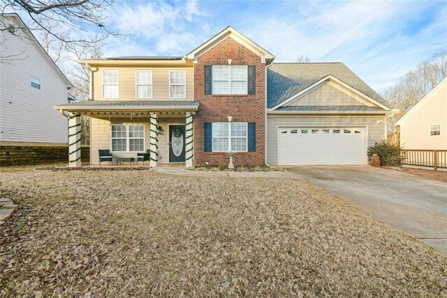 view of front of property with a garage