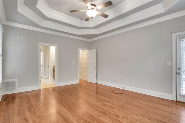 26 Trillium Ln, Acworth, GA 30101 - unfurnished bedroom featuring a raised ceiling, crown molding, light wood finished floors, a ceiling fan, and baseboards