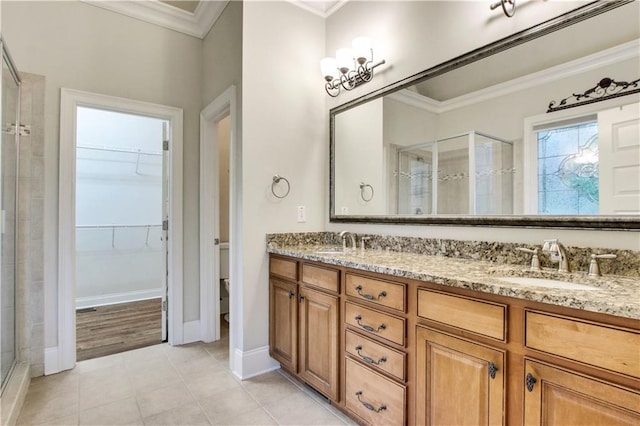 26 Trillium Ln, Acworth, GA 30101 - full bathroom with ornamental molding, a stall shower, a spacious closet, double vanity, and tile patterned flooring