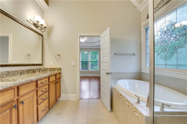 26 Trillium Ln, Acworth, GA 30101 - full bathroom featuring crown molding, double vanity, a bath, tile patterned flooring, and baseboards