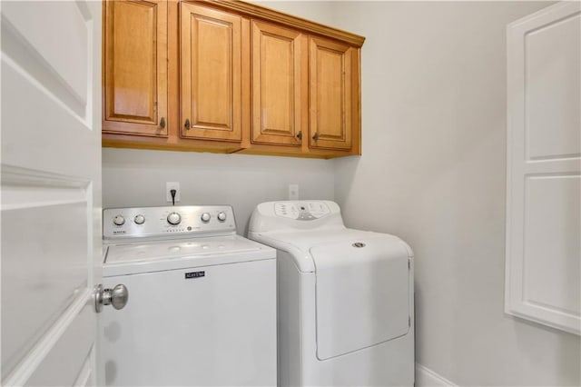 26 Trillium Ln, Acworth, GA 30101 - laundry room with washing machine and clothes dryer and cabinet space