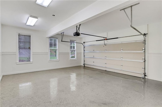 26 Trillium Ln, Acworth, GA 30101 - garage featuring wainscoting and a garage door opener
