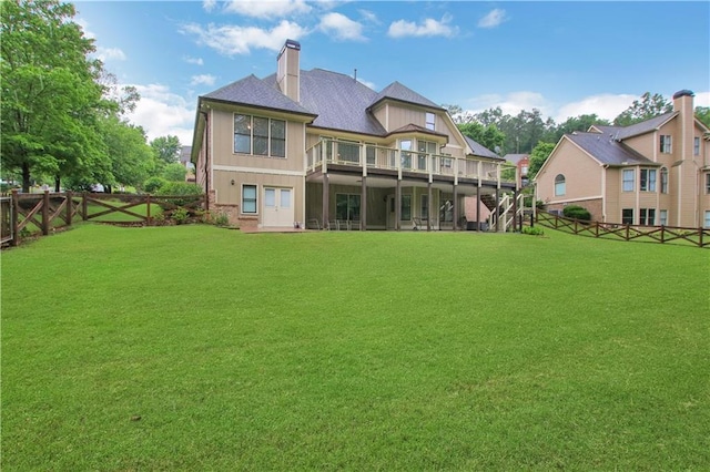 26 Trillium Ln, Acworth, GA 30101 - back of house with stairway, a deck, a chimney, and a shingled roof
