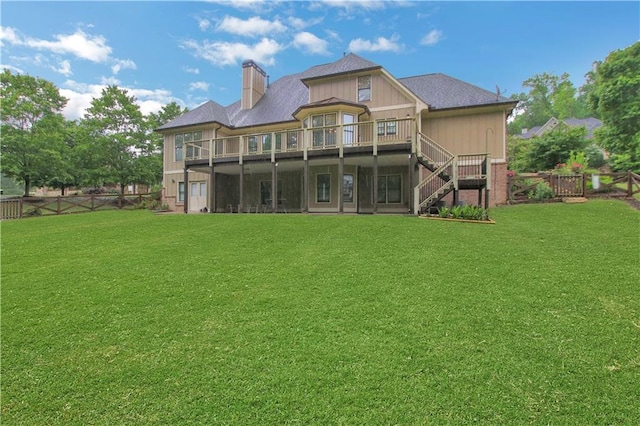 26 Trillium Ln, Acworth, GA 30101 - rear view of house with a chimney, stairs, and a wooden deck