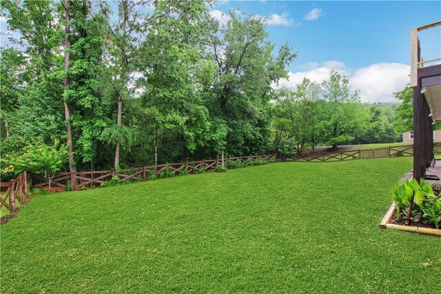 26 Trillium Ln, Acworth, GA 30101 - view of yard with view of wooded area