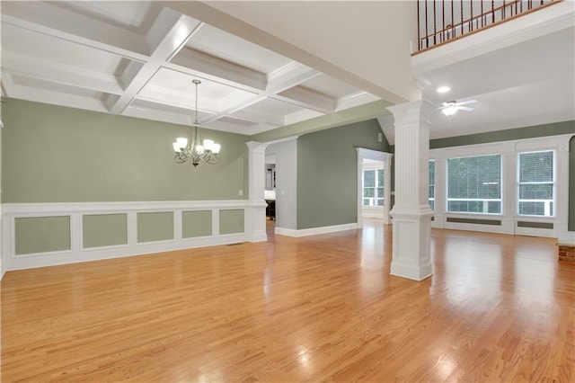 26 Trillium Ln, Acworth, GA 30101 - unfurnished living room featuring decorative columns, a chandelier, ceiling fan, beamed ceiling, and light wood finished floors
