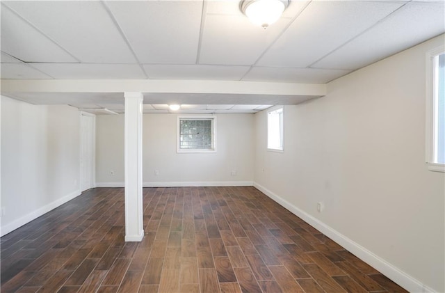 basement featuring a drop ceiling