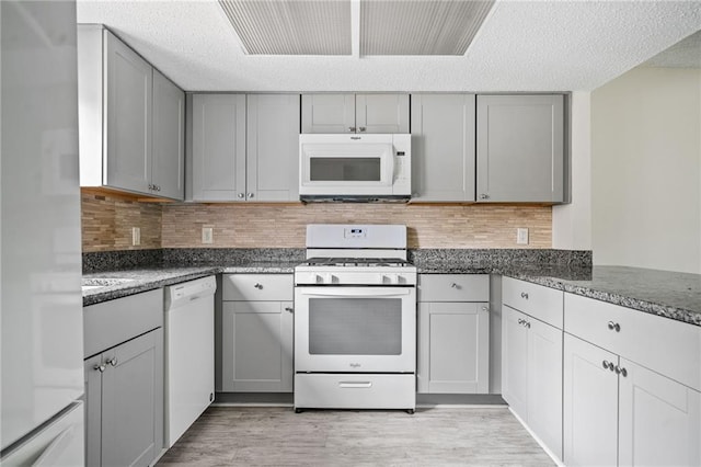 66 Fair Haven Way SE, Smyrna, GA 30080 - spare room with a textured ceiling and wood finished floors