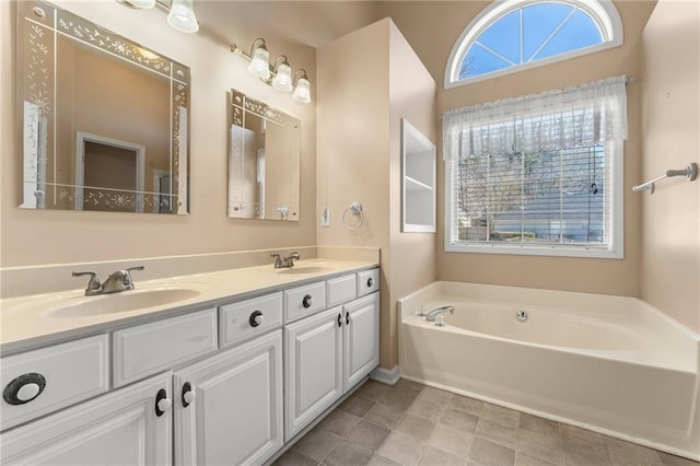 bathroom featuring vanity and a tub to relax in