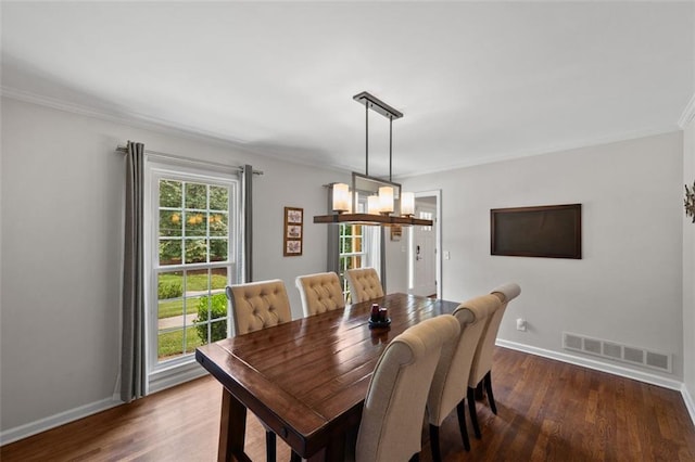 3912 Edenton Ct NE, Brookhaven, GA 30319 - dining room with ornamental molding, dark wood-style floors, baseboards, and a chandelier