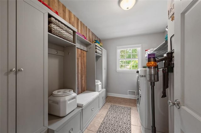 3912 Edenton Ct NE, Brookhaven, GA 30319 - mudroom with washer and clothes dryer and baseboards