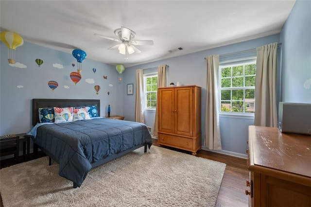 3912 Edenton Ct NE, Brookhaven, GA 30319 - bedroom with wood finished floors and ceiling fan
