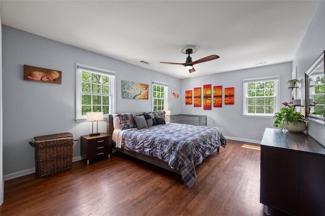3912 Edenton Ct NE, Brookhaven, GA 30319 - bedroom with multiple windows, dark wood finished floors, and baseboards