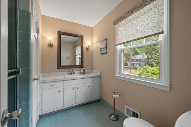 3912 Edenton Ct NE, Brookhaven, GA 30319 - bathroom with toilet and vanity