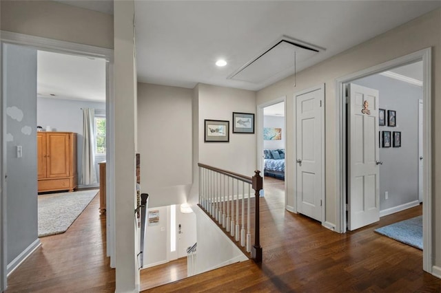 3912 Edenton Ct NE, Brookhaven, GA 30319 - corridor featuring attic access, an upstairs landing, wood finished floors, baseboards, and recessed lighting