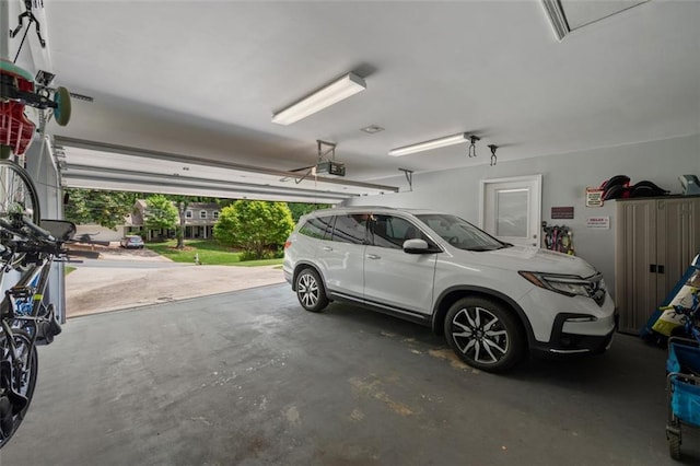 3912 Edenton Ct NE, Brookhaven, GA 30319 - garage featuring a garage door opener