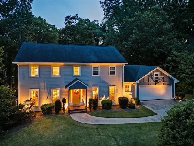 3912 Edenton Ct NE, Brookhaven, GA 30319 - colonial house with a garage, concrete driveway, and a front lawn