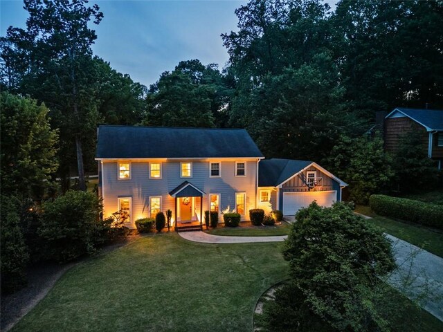 3912 Edenton Ct NE, Brookhaven, GA 30319 - colonial house with a garage, a front yard, and driveway