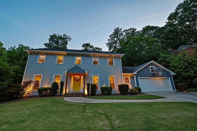 3912 Edenton Ct NE, Brookhaven, GA 30319 - colonial home with driveway, a garage, a front lawn, and board and batten siding