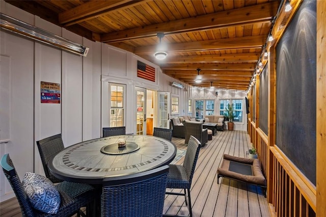 3912 Edenton Ct NE, Brookhaven, GA 30319 - sunroom with outdoor dining area, beamed ceiling, french doors, and outdoor lounge area