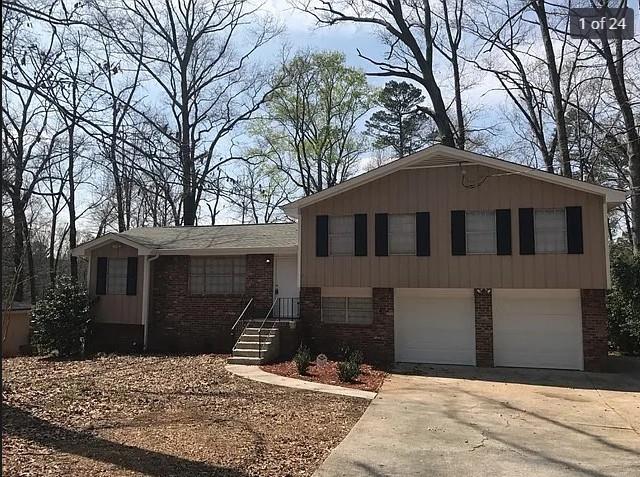 split level home featuring a garage