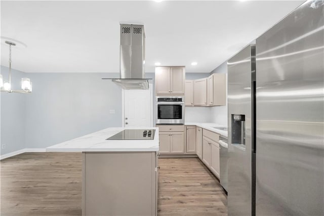 3355 Wesley Chapel Rd, Decatur, GA 30034 - kitchen featuring stainless steel appliances, island range hood, light wood-style floors, a center island, and recessed lighting