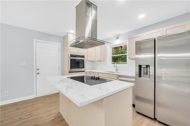3355 Wesley Chapel Rd, Decatur, GA 30034 - kitchen with stainless steel appliances, island exhaust hood, a sink, light wood finished floors, and recessed lighting