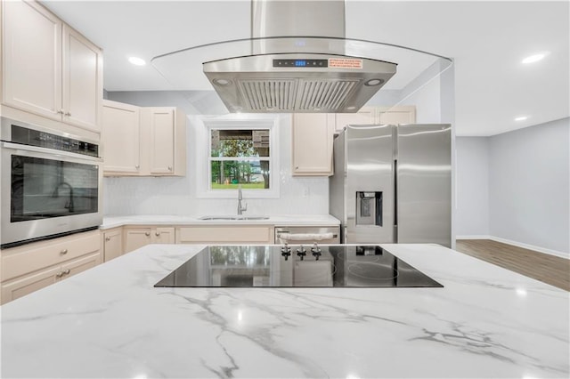 3355 Wesley Chapel Rd, Decatur, GA 30034 - kitchen with stainless steel appliances, a sink, backsplash, light stone counters, and recessed lighting