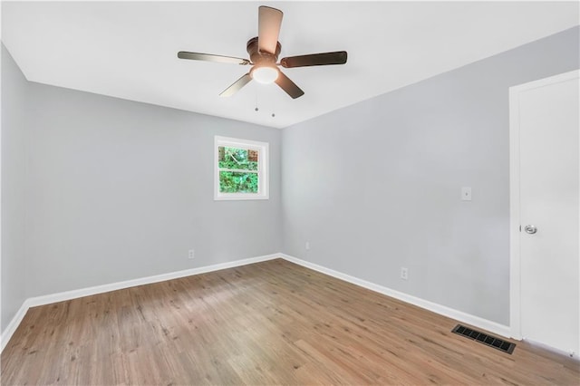 3355 Wesley Chapel Rd, Decatur, GA 30034 - empty room with baseboards, a ceiling fan, and wood finished floors