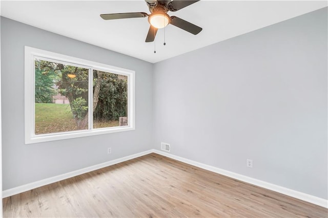 3355 Wesley Chapel Rd, Decatur, GA 30034 - unfurnished room featuring baseboards, wood finished floors, and ceiling fan