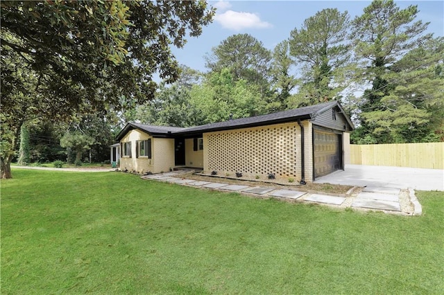 3355 Wesley Chapel Rd, Decatur, GA 30034 - back of house featuring concrete driveway, a garage, and brick siding