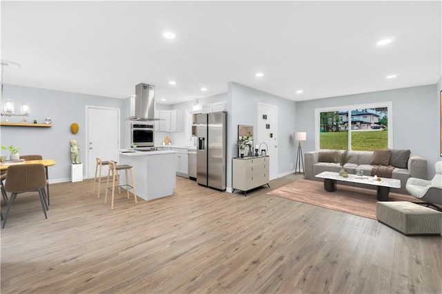 3355 Wesley Chapel Rd, Decatur, GA 30034 - living area with light wood-type flooring, baseboards, recessed lighting, and a chandelier
