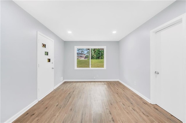 3355 Wesley Chapel Rd, Decatur, GA 30034 - empty room featuring light wood-style floors, baseboards, and recessed lighting
